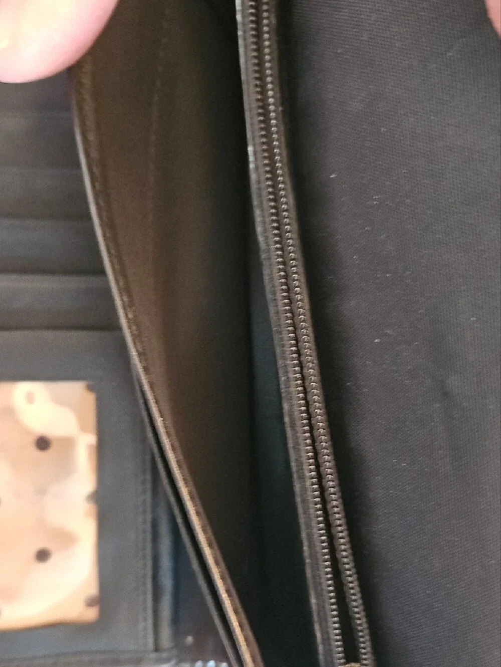 kate spade black wallet with gold-tone nameplate